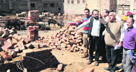 Members of the management of the Devi Sahai Khanna Family Dharmarth Trust show the alleged grabbing of trust property by an MLA in Amritsar on Thursday.