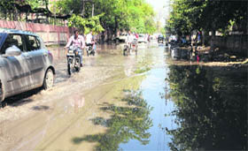 The road between the Mini-secretariat and the womens police station has been inundated with rain water in Bathinda creating problems for the commuters.