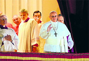 Pope Francis at the window of St Peter's Basilica's balcony, at the Vatican, after being elected the 266th Pope of the Roman Catholic Church