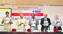 Prof DN Reddy (centre) releases the proceedings of the national conference on Contemporary Techniques and Technologies in Electronic Engineering at Murthal university. Photo by writer 