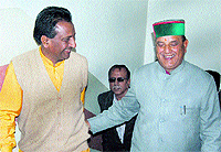 RS Mankotia (L), KCC Bank Chairman, and Jagdish Sapiya (R), Congress nominee for the post of Chairman, in Dharamsala on Thursday