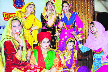 College girls prepare to take part in a giddha contest during the youth festival at DAV College in Jalandhar on Thursday.