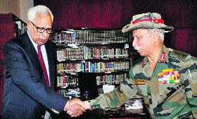 Governor NN Vohra with Northern Command chief Lt Gen KT Parnaik at Raj Bhawan in Jammu on Thursday.