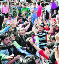 Ladakh-bound passengers demonstrate in Jammu on Thursday.