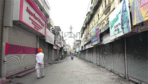 Patiala shopkeepers close their shutters in protest against the imposition of property tax on Thursday. 