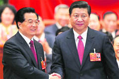 Hu Jintao (L) with Chinas newly elected President Xi Jinping in Beijing on Thursday.  Reuters