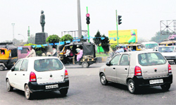 Vehicles jump the newly installed traffic lights at Bhandari Bridge roundabout. 
