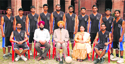 Members of Khalsa College netball team with principal Dr Daljit Singh (centre) in Amritsar on Friday. A tribune photograph