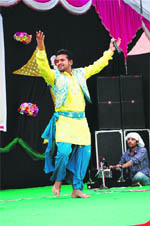 A cultural performance in progress at the function.