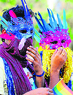 Members of the LGBT Society, holding a six-coloured liberation flag, take part in a pride walk in Chandigarh on Friday