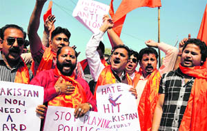 Shiv Sena activists protest against terror attack leaving five CRPF jawans in Jammu on Friday. 