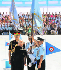 President Pranab Mukherjee presents colours to the Air Force Central Medical Establishment and No. 3 Base Repair Depot in Chandigarh on Friday. Tribune photo: Manoj Mahajan