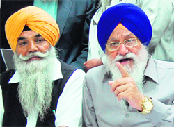 SGPC president Avtar Singh Makkar (R) addresses mediapersons after the SGPC's annual budget in Amritsar on Friday. Photo: Sameer Sehgal