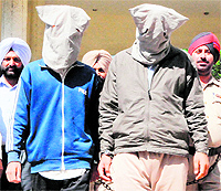 The two persons, who snatched an SLR from a policeman, in police custody in Amritsar on Saturday