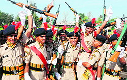  Recruits of the Indo-Tibetan Border Police dance after the passing-out parade at a signal training school in Amritsar on Saturday