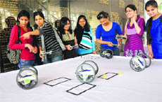 Students display their creations on the second day of PEC fest "Vyom" in Chandigarh on Saturday.