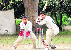 A batsman in action during a match in the Doon International Cricket Championship in Dehradun on Saturday. Tribune photo: Vinod Pundir