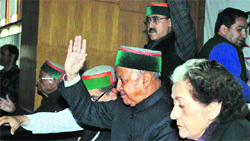 Chief Minister Virbhadra Singh and Irrigation and Public Health Minister Vidya Stokes attend a meeting of the Himachal Pradesh Congress Committee in Shimla on Saturday. Photo: Amit Kanwar