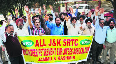  Members of the All JK SRTC Volunteer Retirement Employees Association stage protest in Jammu.