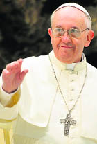 Pope Francis addresses  members of the media on  Saturday at the Vatican. 
