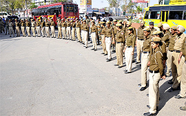 A posse of police personnel cordon off the area near Fauji Chowk to stop the protesting ETT teachers from moving towards the District Administrative Complex in Bathinda on Sunday