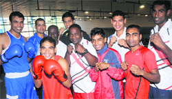 Boxers of the Army Sports Institute, Pune, in a jubilant mood after winning the overall AK Mishra Boxing Championship at Sector 10 in Chandigarh on Sunday.