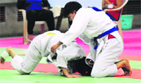 Players in action during a judo match at Panjab University in Chandigarh on Sunday.