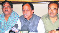 Subash Shastri, president, National Mazdoor Conference, addresses mediapersons in Jammu on Sunday. A Tribune Photograph