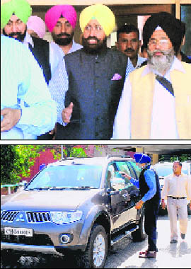 PPCC chief Partap Singh Bajwa (in yellow turban) comes out of the Advanced Trauma Centre at the PGI on Monday; and (below) a security official requests the driver of a VIP vehicle, part of Bajwa's convoy, to move the vehicle away from the front gate of the trauma centre. 