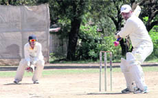 A batsman in action during a match in the Doon International Cricket Championship in Dehradun on Monday. 