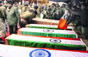 Bodies of CRPF jawans killed in a suicide attack in Srinagar last week being sent home after a wreath-laying ceremony.