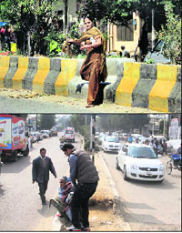 A woman crosses a road from the broken central verge at Preet Nagar; and an old woman does so at Kapurthala Chowk in Jalandhar. 