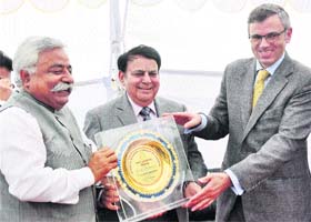 Minister for Planning and Development Ajay Sadhotra receives Best Legislator Award from CM Omar Abdullah in Jammu on Monday