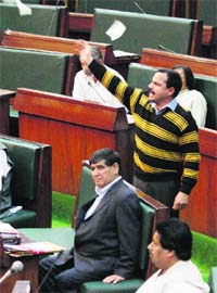 Panthers Party MLA Balwant Singh Mankotia protests during the question hour in the Assembly on Monday