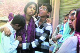 Home Guards jawan Varinder Partap Pandey's wife Geeta Pandey with her sons
