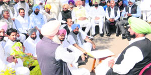Congress mock session in progress outside the Vidhan Sabha complex in Chandigarh on Monday.