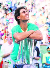 Rafael Nadal with the winners trophy