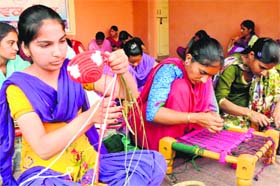 Participants busy making items during the handicraft-making competition