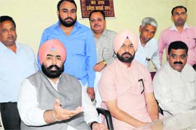 District Congress in-charge Kushaldeep Dhillon along with former MLA Haminder Jassi (middle) interacts with mediapersons in Bathinda on Tuesday
