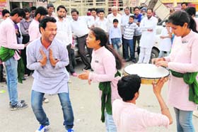 Artistes staging a street play 'Tennu ki, mainu ki, saanu ki' as part of the ongoing theatre festival in Bathinda on Tuesday