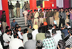 BJP workers lay a siege to the Sector 19 police station in protest against an alleged assault on two party activists by the police in Chandigarh on Tuesday