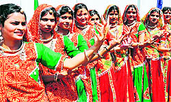Girls of Gurukul Kangri University all set for a folk song presentation during their annual function in Haridwar on Tuesday