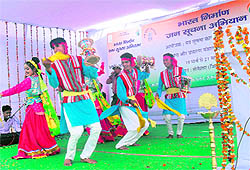 A cultural troupe of the Song and Drama Division performs at the inaugural function of the launching of a campaign of the Public Information Bureau in Someshwar on Tuesday
