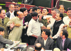 Opposition members engaged in a spat with Independent MLA Engineer Rasheed (extreme left) in the Assembly on Tuesday. 