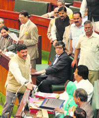 BJP state chief Jugal Kishore Sharma and Social Welfare Minister Sakina Itoo get into a verbal duel in the Lower House in Jammu on Tuesday.