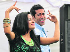 Miss Pooja and Tarun Kapoor promote their upcoming movie 'Pooja kiwein aa' at the GGNIMT in Ludhiana on Tuesday. 