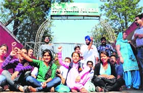 Students of the PGGCG-11 hold a protest on the college premises in Chandigarh on Wednesday