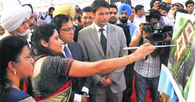 Punjab and Haryana High Court Chief Justice AK Sikri (second from left) looks at the map of the court complex at Sector 76 in Mohali on Wednesday