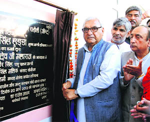 Chief Minister Bhupinder Singh Hooda inaugurates the Embryo Transfer Technology Research Centre at Dharoli (Jind) on Wednesday. 