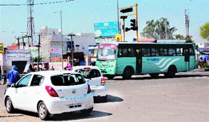 Non-operational traffic signal lights at the New Amritsar Crossing on the GT road pose a danger to commuters.